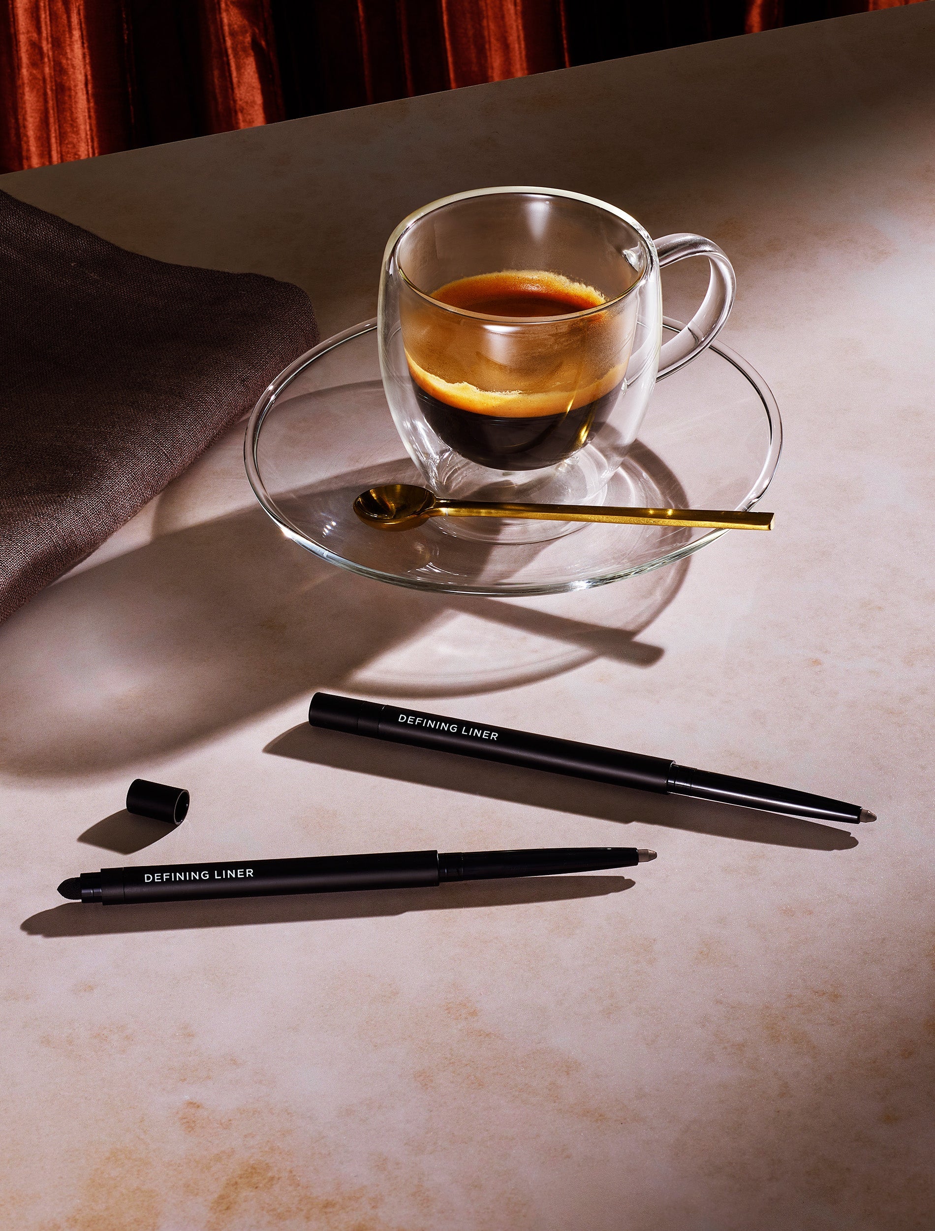 Defining Eyeliner with Coffee Cup