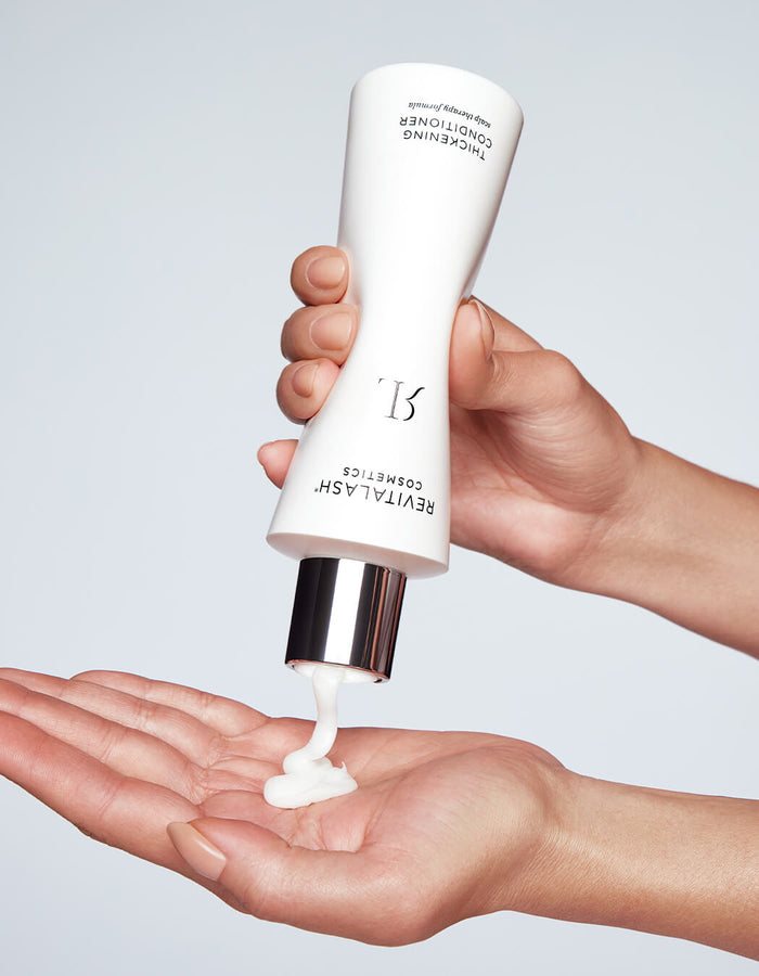 model pouring Thickening Conditioner onto hand